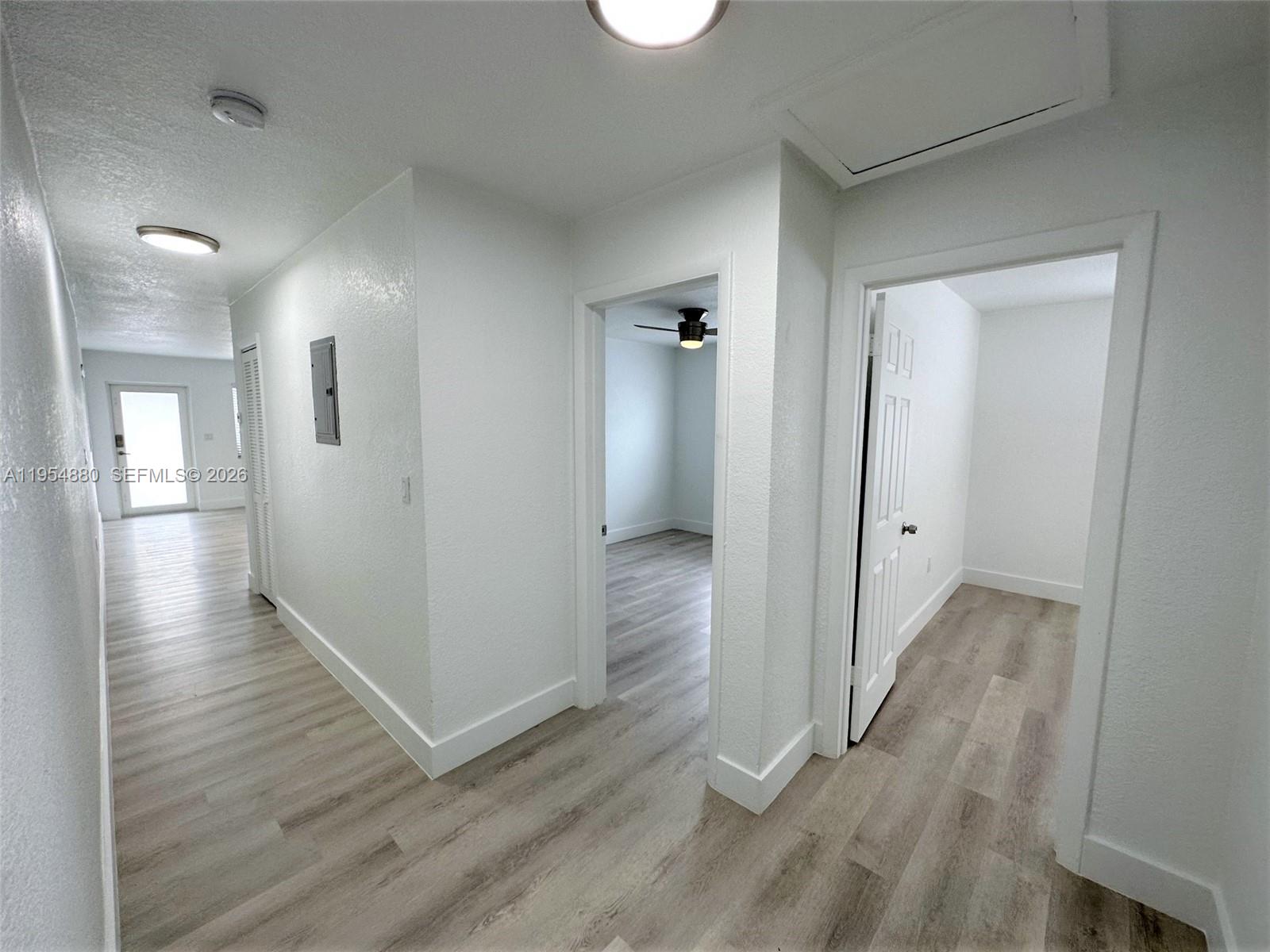 11230 Southwest 5th Street, Unit 1 Sweetwater, FL 33174 - Photo 9 of 25 wooden floor in a gallery