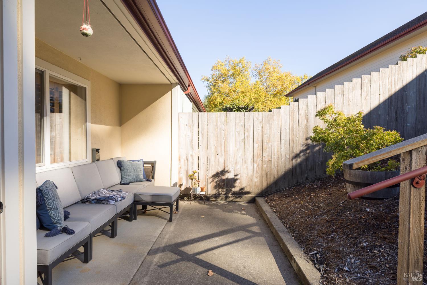 14632 Jomark Lane Occidental, CA 95465 - Photo 11 of 29 a living room with furniture and a potted plant
