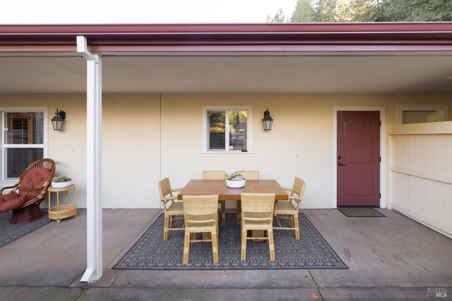 14632 Jomark Lane Occidental, CA 95465 - Photo 5 of 29 a dining room with furniture and a rug