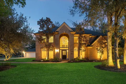 front view of house with a garden