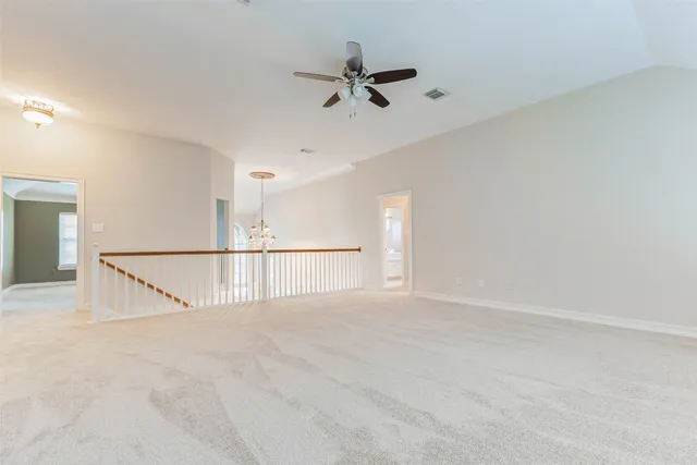 a spacious bathroom with bathtub and shower
