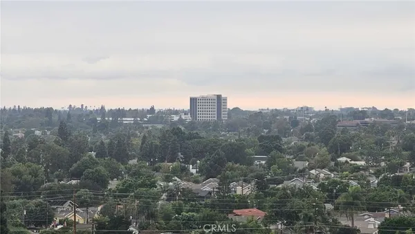 a view of a city with tall buildings