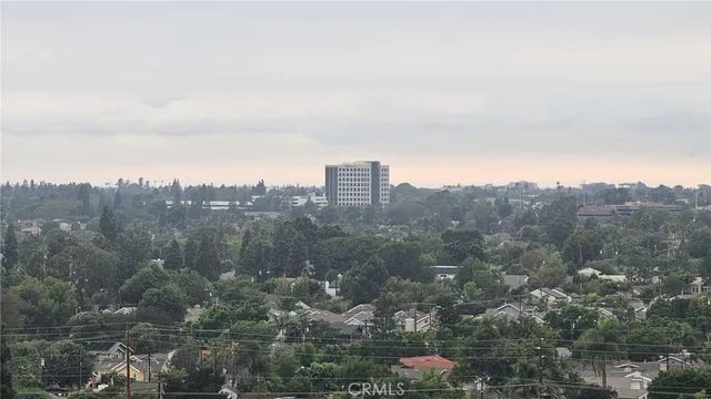 a view of a city with tall buildings
