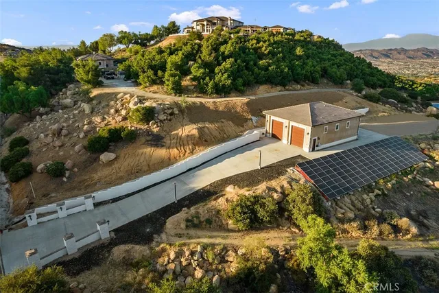 a view of a hallway with a chandelier