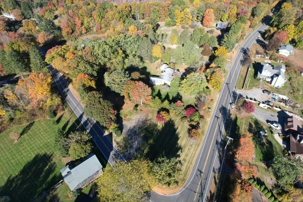 a view of outdoor space with trees all around