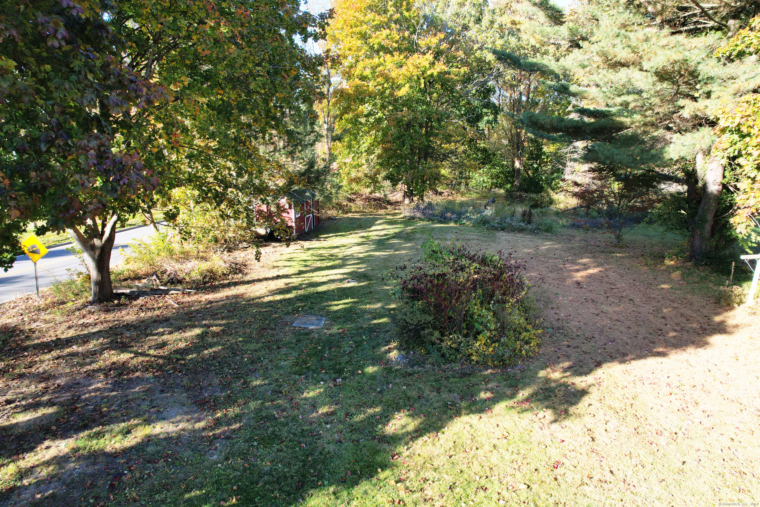 1543 Litchfield Road Watertown, CT 06795 - Photo 7 of 7 a view of outdoor space with trees all around