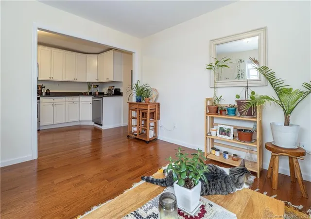 a kitchen with a table and chairs