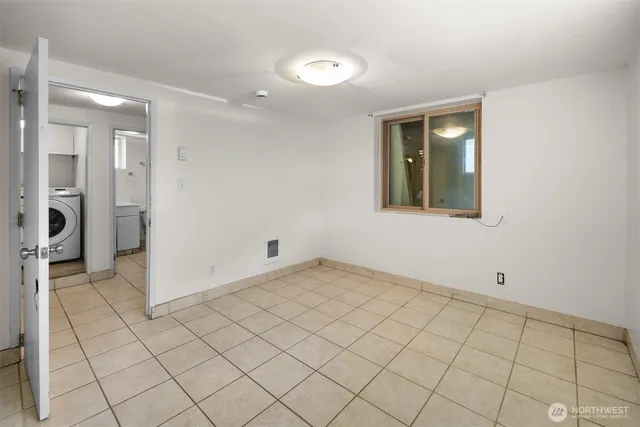 a view of an empty room and window