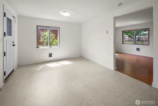 an empty room with windows