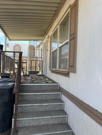 a view of entryway with a front door