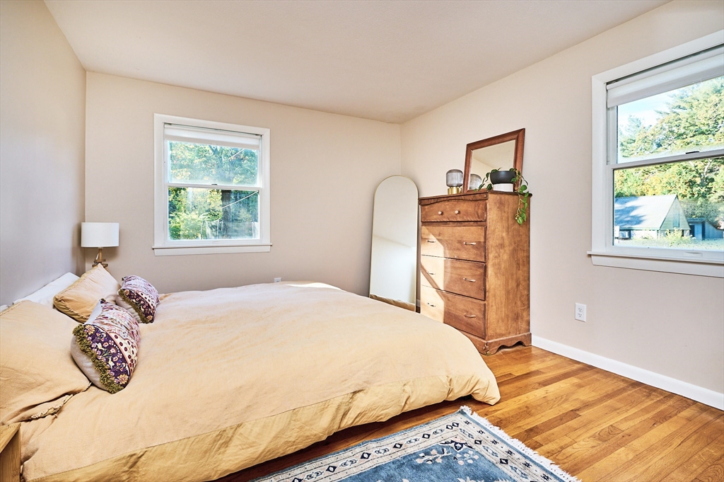 795 A Westhampton Road Northampton, MA 01062 - Photo 12 of 25 a bedroom with a bed and a window