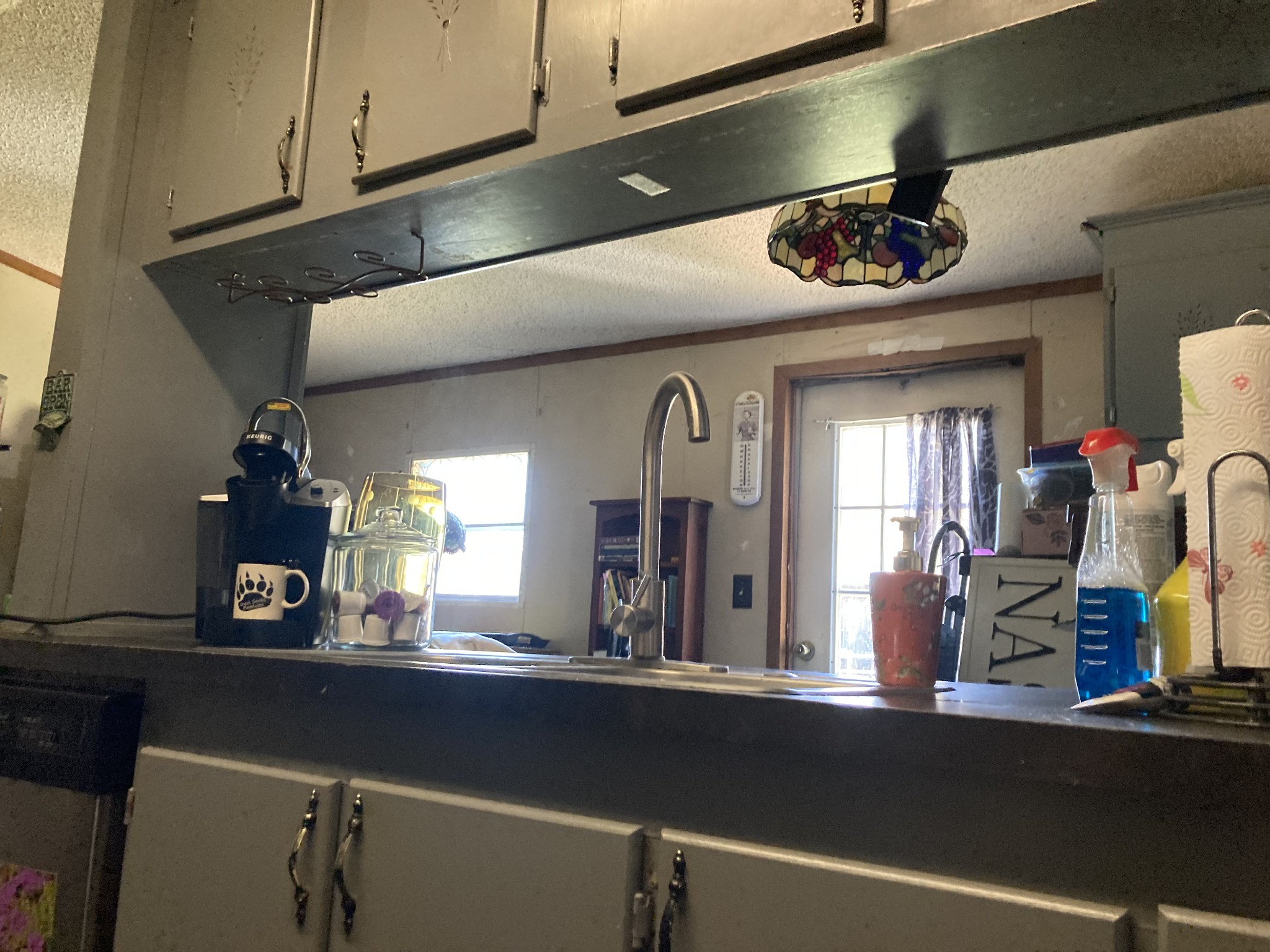 472 Allen Chapel Road Hilham, TN 38568 - Photo 6 of 28 a kitchen with a refrigerator and a sink