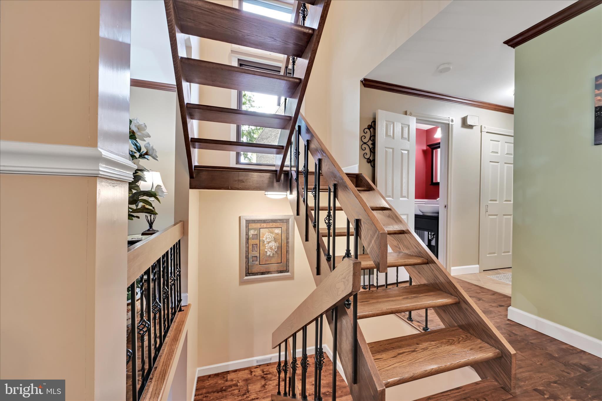 57 Wood Circle Reading, PA 19607 - Photo 21 of 46 a view of staircase with lots of frames on wall and a window