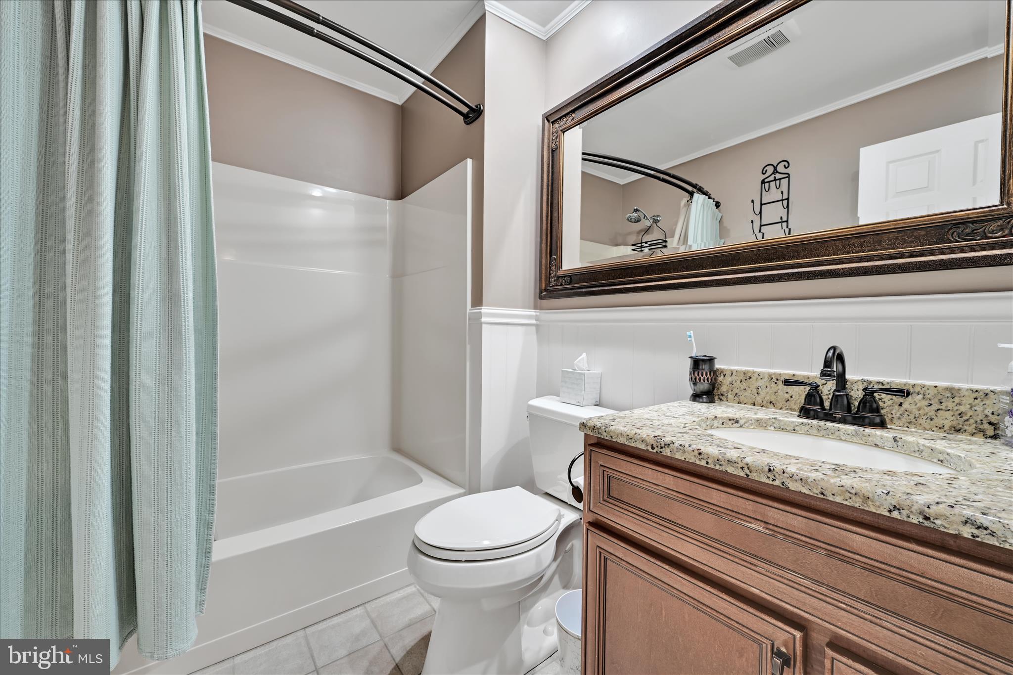 57 Wood Circle Reading, PA 19607 - Photo 26 of 46 a bathroom with a granite countertop sink mirror vanity and toilet