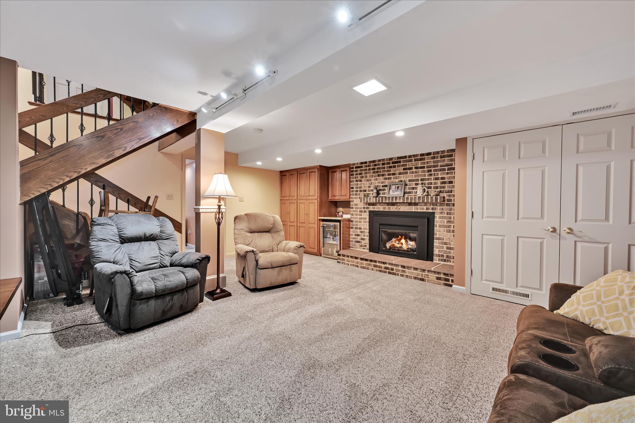 57 Wood Circle Reading, PA 19607 - Photo 35 of 46 a living room with furniture and a fireplace