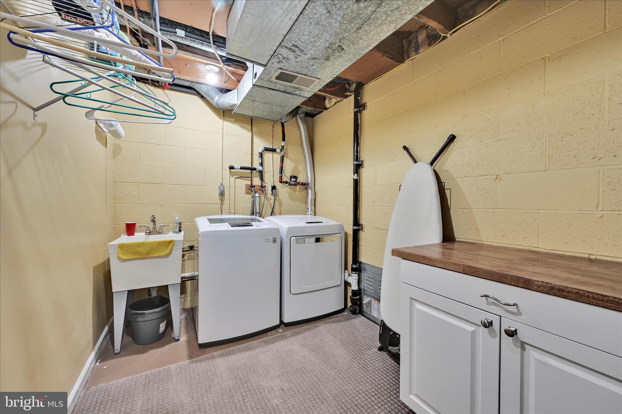 57 Wood Circle Reading, PA 19607 - Photo 38 of 46 a utility room with dryer and washer