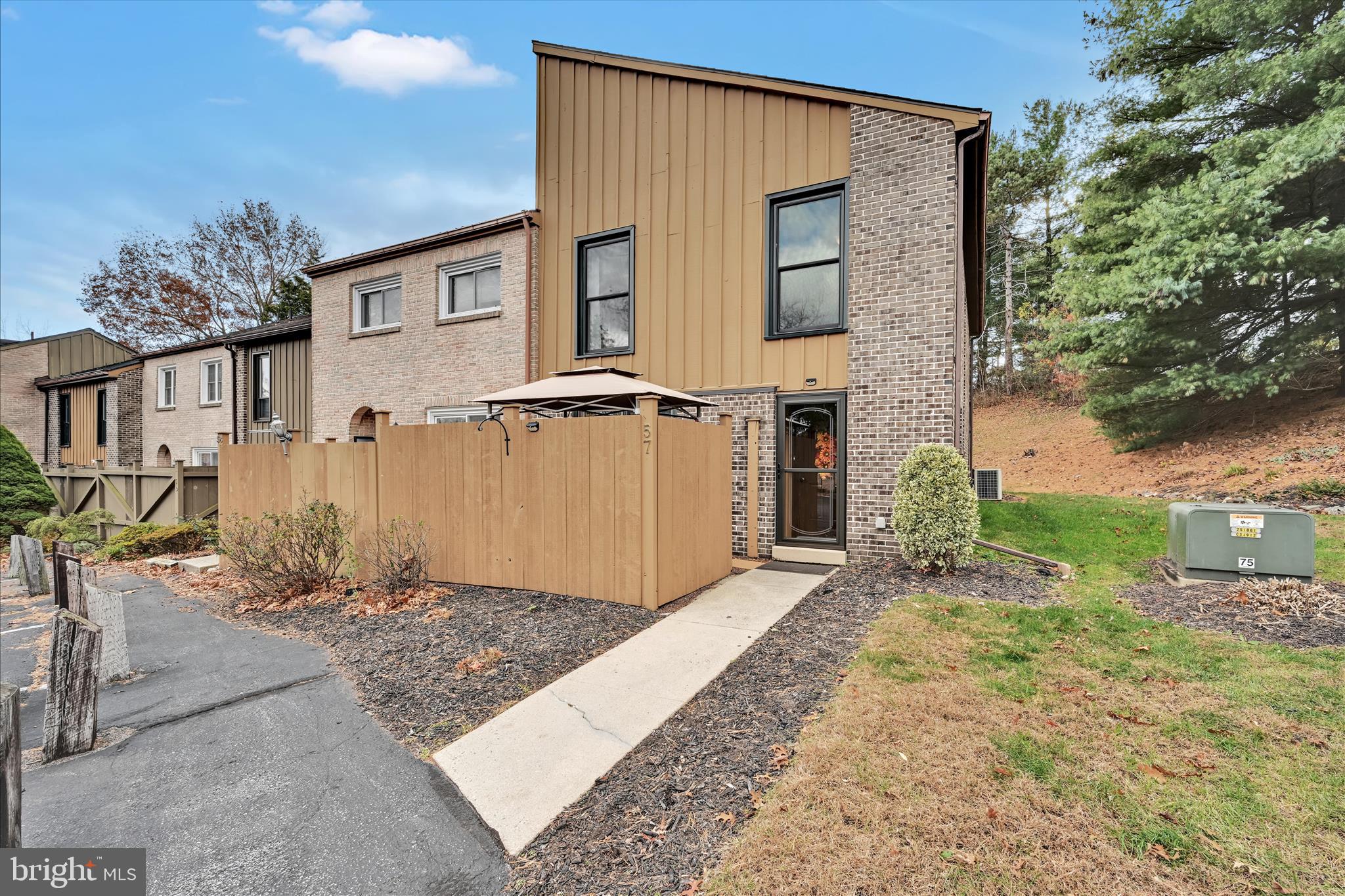 57 Wood Circle Reading, PA 19607 - Photo 8 of 46 front view of a house with a yard