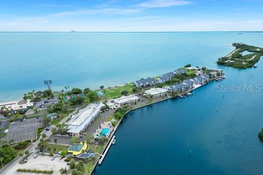 611 Destiny Drive, Unit 210 Ruskin, FL 33570 - Photo 15 of 48 an aerial view of a houses with a lake view