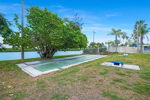 611 Destiny Drive, Unit 210 Ruskin, FL 33570 - Photo 16 of 48 a view of a park with large trees