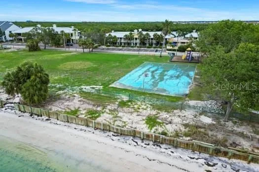 a view of a garden with lawn chairs