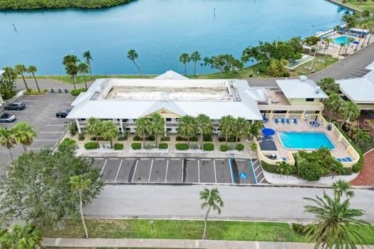 611 Destiny Drive, Unit 210 Ruskin, FL 33570 - Photo 4 of 48 an outdoor view with patio