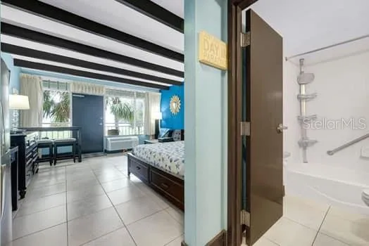 a view of living room with furniture and windows