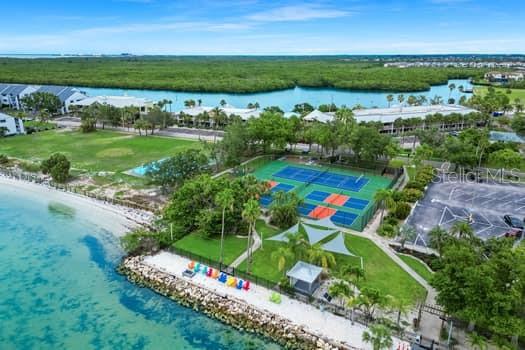 611 Destiny Drive, Unit 210 Ruskin, FL 33570 - Photo 9 of 48 an aerial view of a golf course with a lake view
