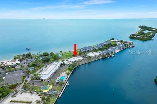 611 Destiny Drive, Unit 210 Ruskin, FL 33570 - Photo 10 of 48 an aerial view of a houses with a lake view