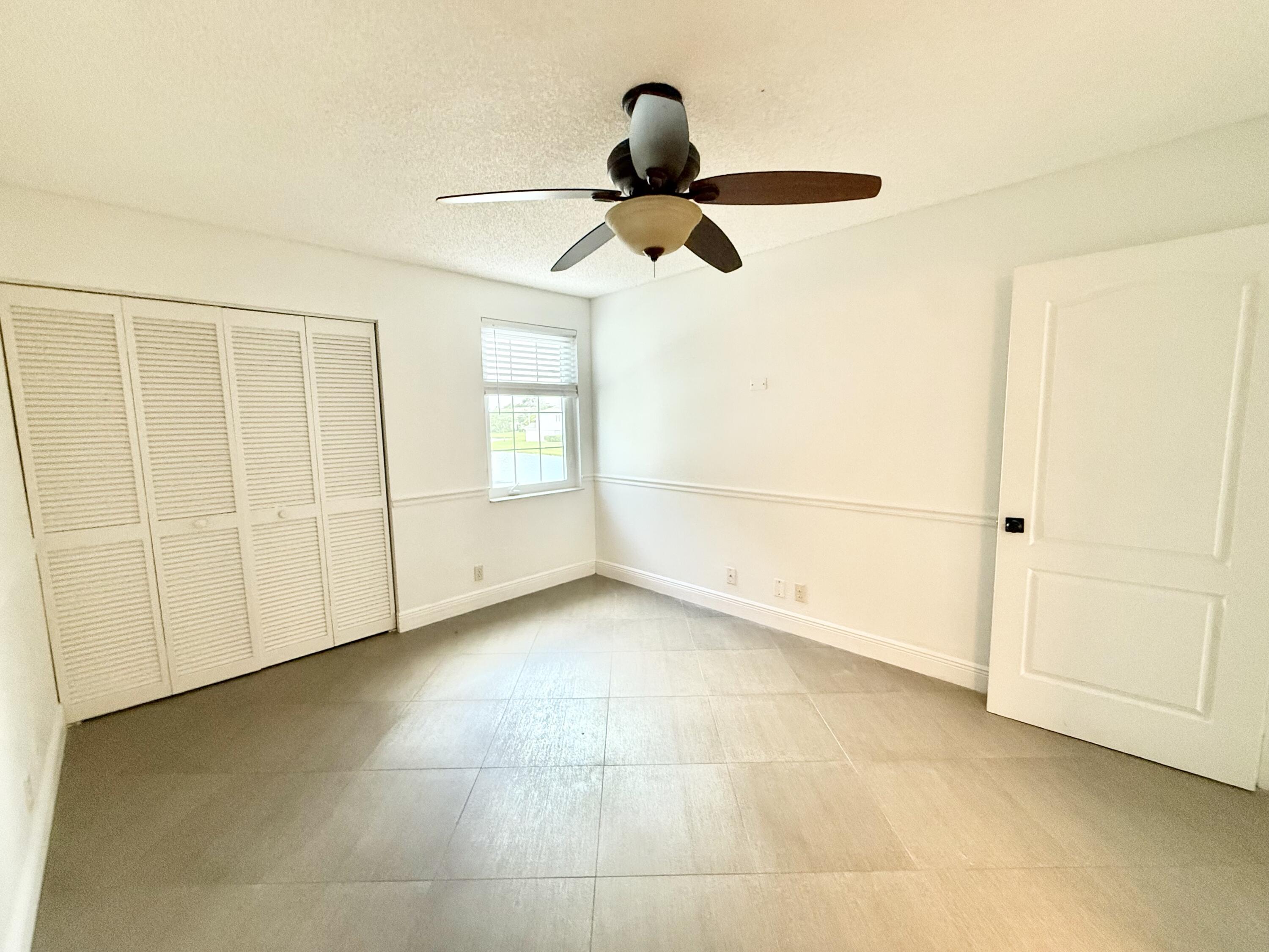 9190 Boca Gardens Parkway, Unit B Boca Raton, FL 33496 - Photo 22 of 35 a view of an empty room