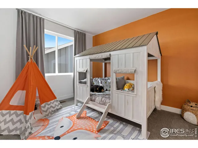 a kitchen with stainless steel appliances a sink and cabinets