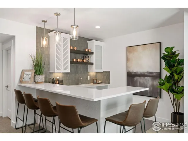 a bathroom with a sink vanity granite and a mirror