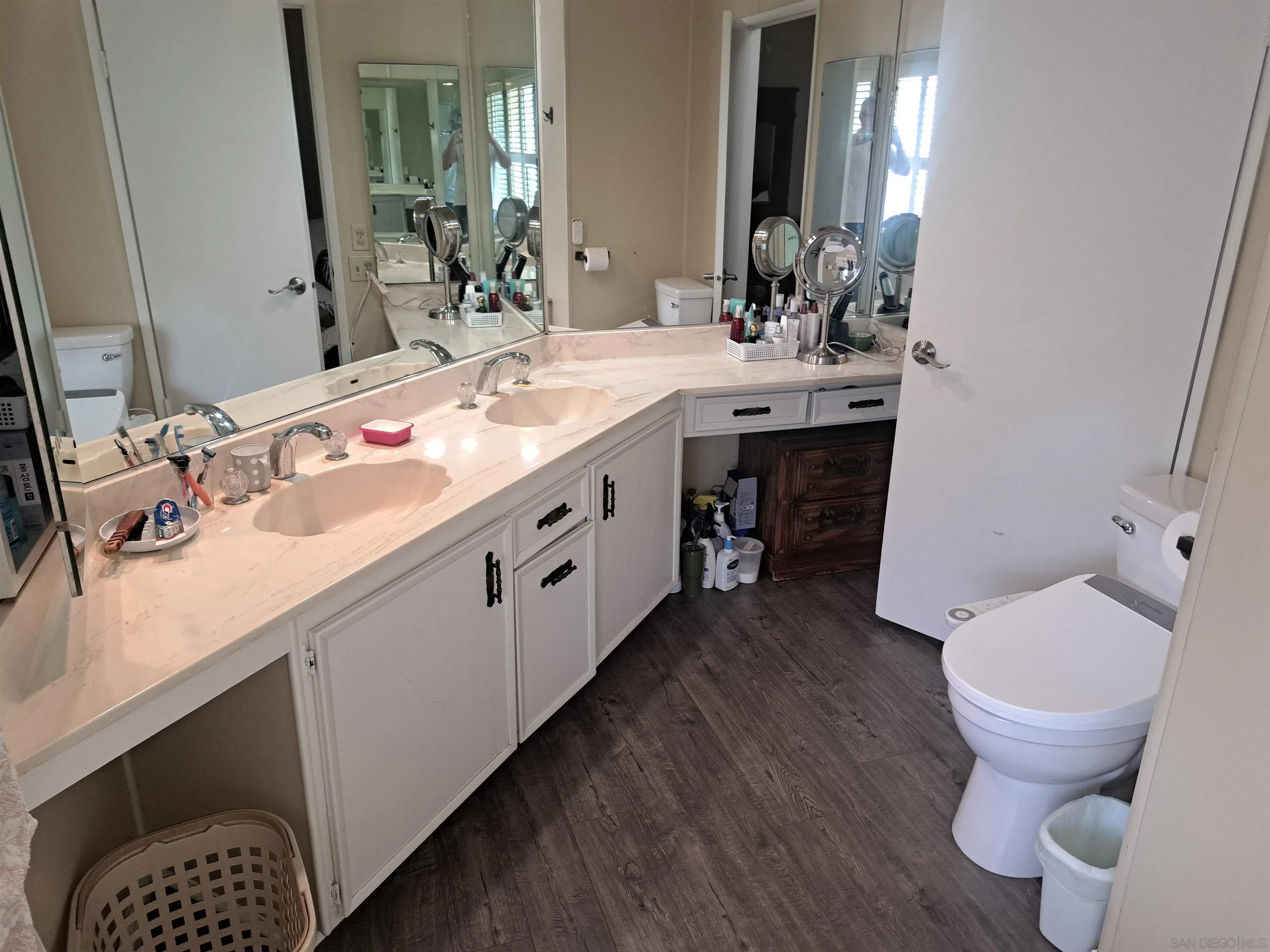 4650 Dulin Road, Unit 12 Fallbrook, CA 92003 - Photo 21 of 36 a bathroom with a sink toilet and mirror
