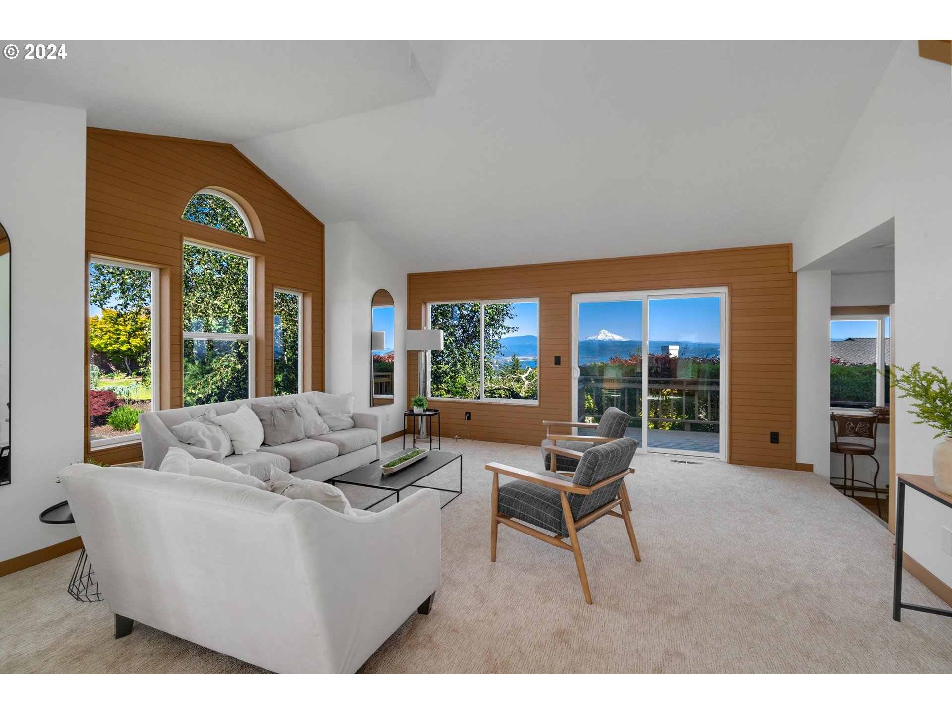 652 Northwest View Ridge Way Camas, WA 98607 - Photo 15 of 39 a living room with furniture and a large window