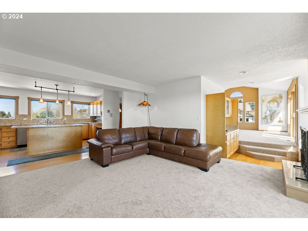 652 Northwest View Ridge Way Camas, WA 98607 - Photo 22 of 39 a living room with furniture and a flat screen tv