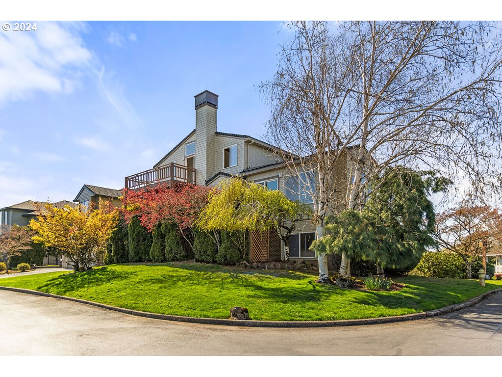 652 Northwest View Ridge Way Camas, WA 98607 - Photo 37 of 39 a front view of a house with a yard and a garage