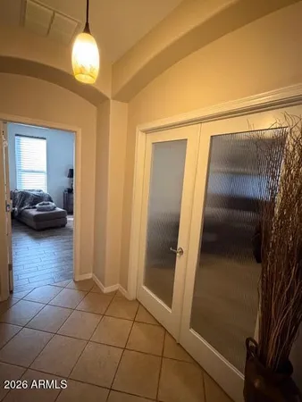 a living room with a couch and a table
