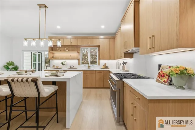 a bathroom with a sink and a window