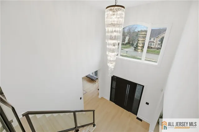 a bathroom with a glass shower door