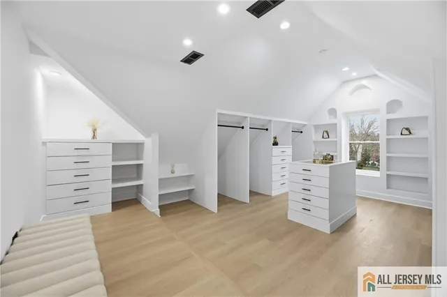 an aerial view of a house with swimming pool and outdoor space