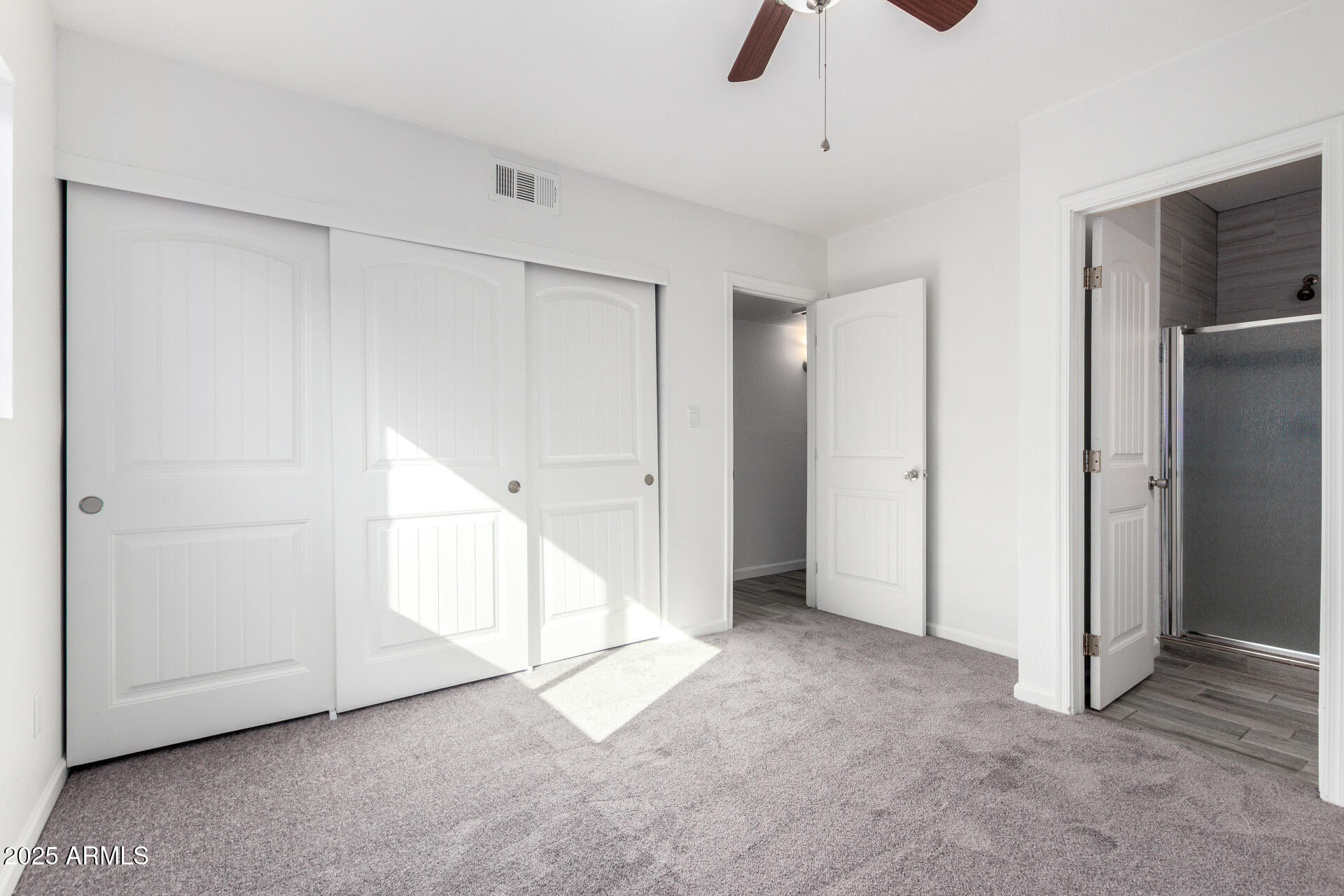830 South Dobson Road, Unit 98 Mesa, AZ 85202 - Photo 13 of 25 a view of an empty room with a window