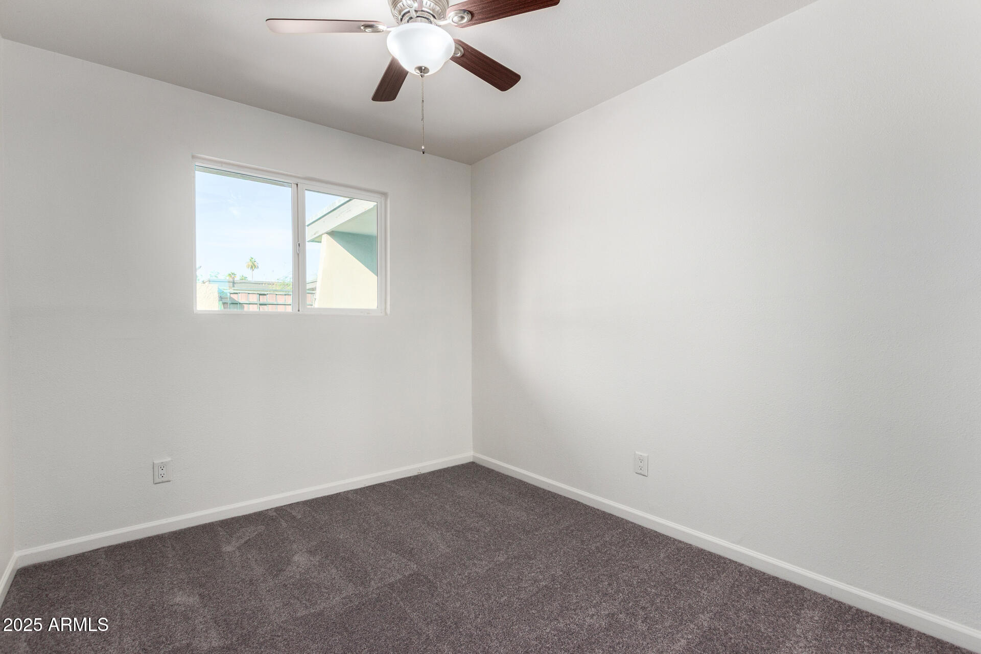 830 South Dobson Road, Unit 98 Mesa, AZ 85202 - Photo 18 of 25 an empty room with a window