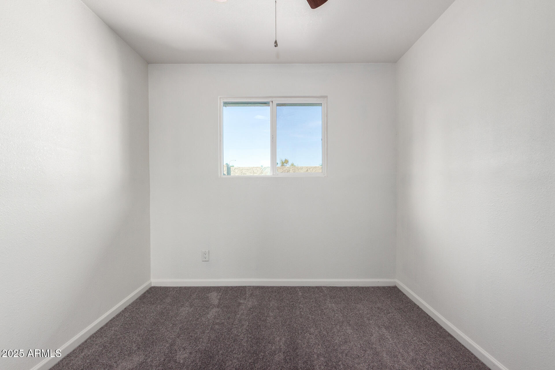 830 South Dobson Road, Unit 98 Mesa, AZ 85202 - Photo 22 of 25 an empty room with a window