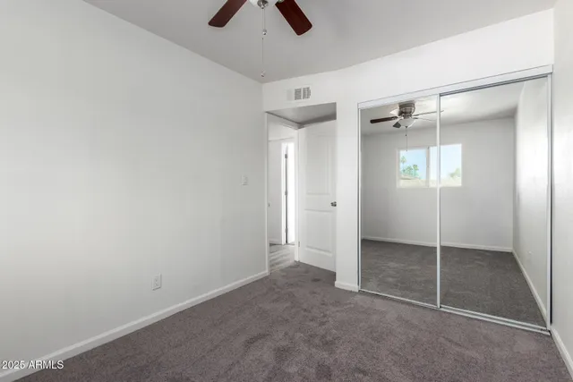 a bathroom with a sink a vanity and a bathtub