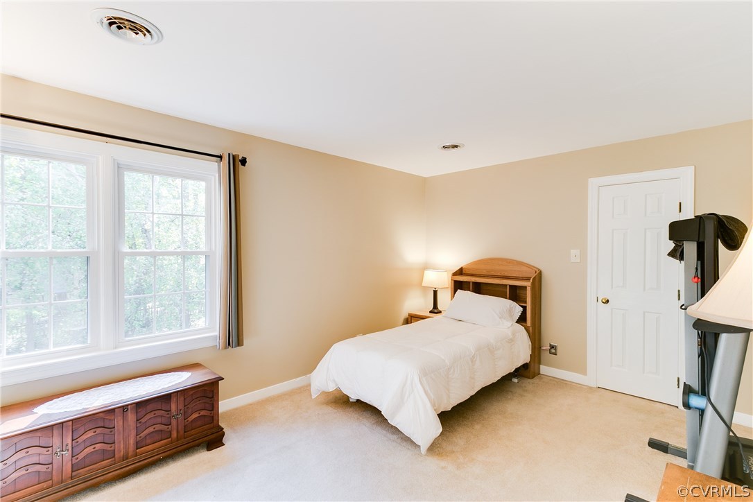 2512 Tanglebrook Road Midlothian, VA 23112 - Photo 17 of 23 a bedroom with a bed and a window