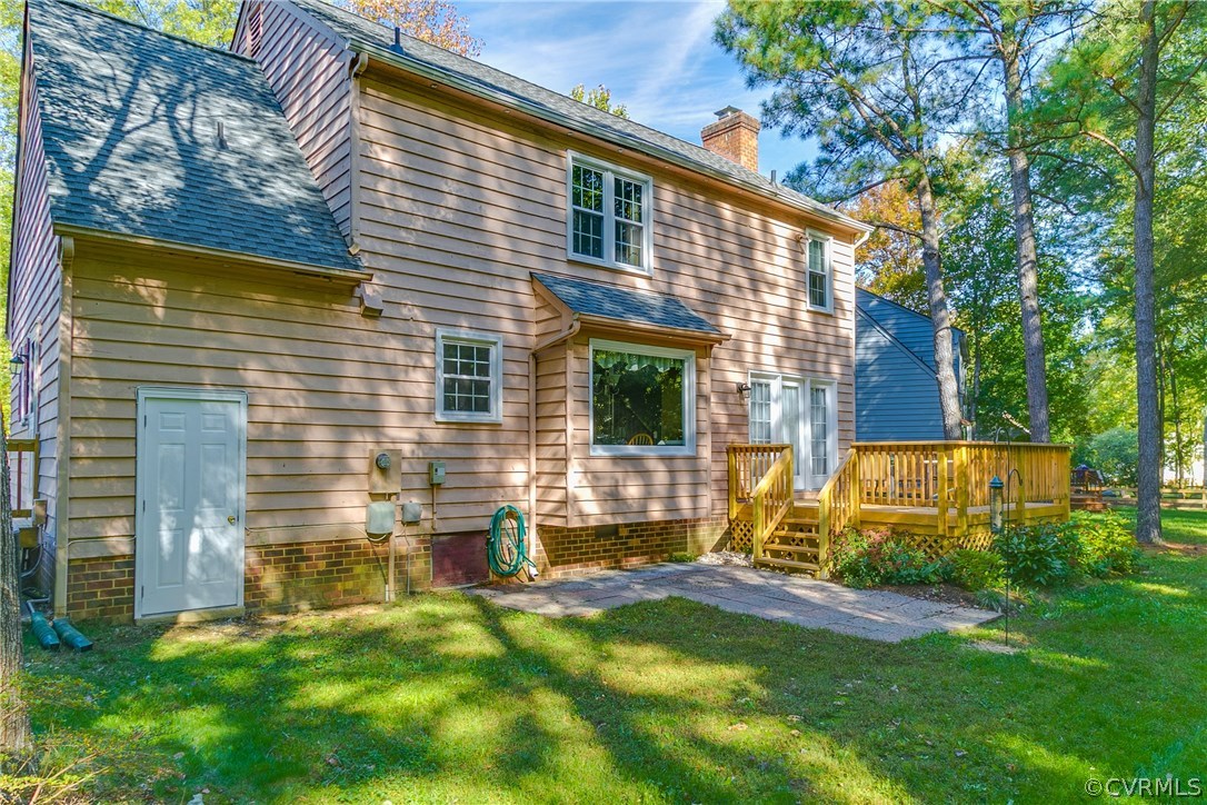 2512 Tanglebrook Road Midlothian, VA 23112 - Photo 2 of 23 a view of backyard with a chair