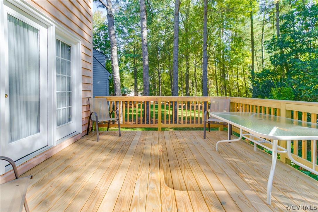 2512 Tanglebrook Road Midlothian, VA 23112 - Photo 4 of 23 a view of a house with backyard and deck