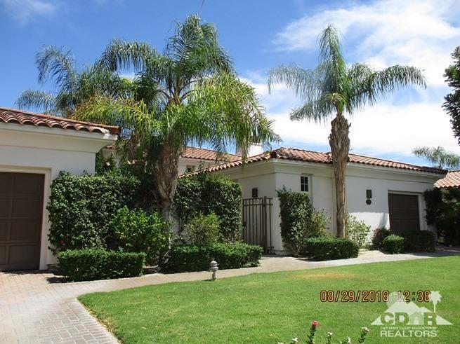 324 Loch Lomond Road Rancho Mirage, CA 92270 - Photo 1 of 51 a front view of house with yard and green space