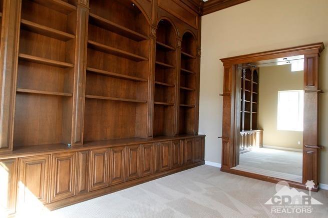 324 Loch Lomond Road Rancho Mirage, CA 92270 - Photo 18 of 51 a view of walk in closet with empty racks