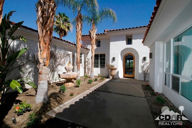 324 Loch Lomond Road Rancho Mirage, CA 92270 - Photo 3 of 51 a view of a patio with couches table and chairs and potted plants