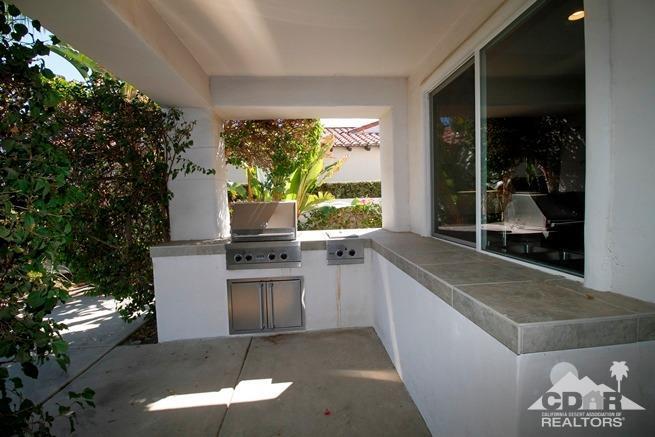324 Loch Lomond Road Rancho Mirage, CA 92270 - Photo 23 of 51 a kitchen with a sink and cabinets